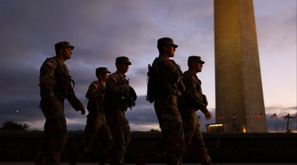 Members of the National Guard walk at the National Mall after U.S. President Donald Trump deployed National Guard troops and ordered an increased presence of federal law enforcement to assist in crime prevention, in Washington, D.C., U.S., August 21, 2025. (Reuters File)