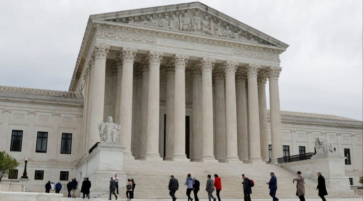 People walk across the plaza of the U.S. Supreme Court building on the first day of the court's new term in Washington, U.S. October 3, 2022. (Reuters File)