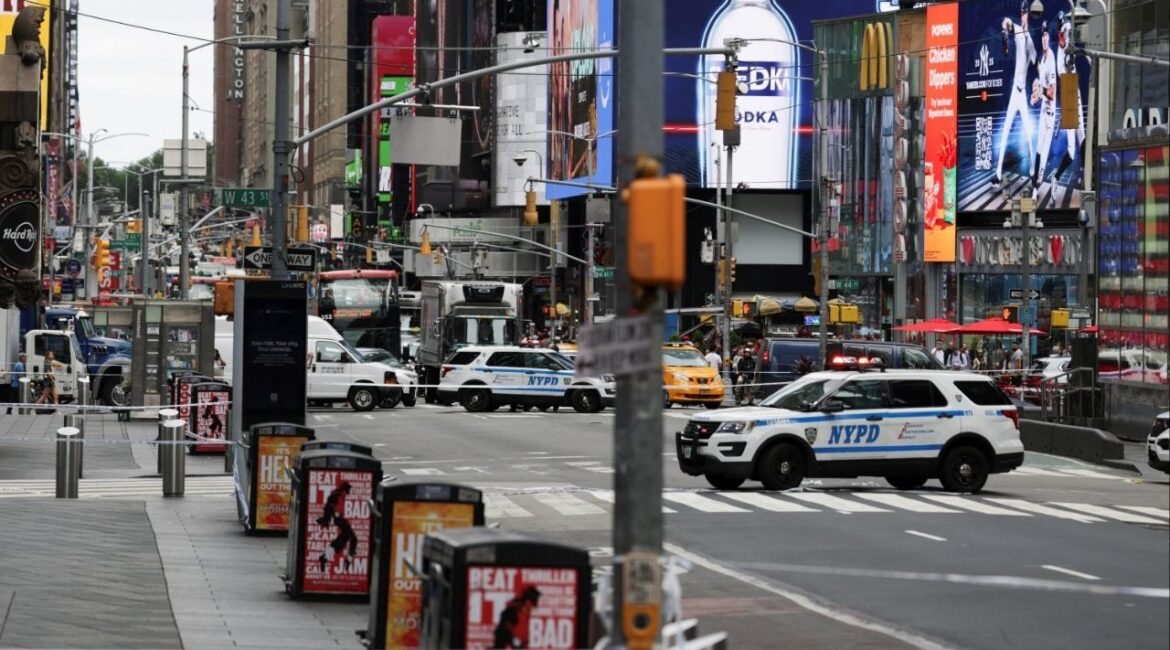 Police vehicles block a street in a cordoned off area in Times Square in New York City, U.S. August 18, 2025. (Reuters/Jeenah Moon)