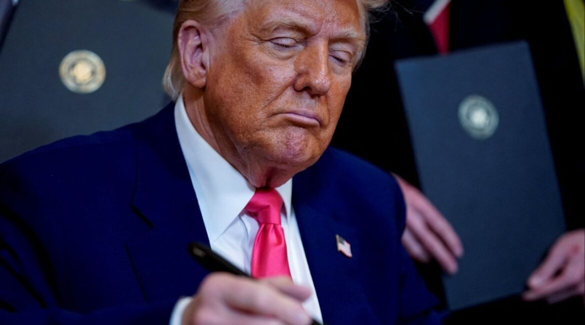 President Donald Trump signs an energy-related executive order, at the White House in Washington, D.C., U.S., April 8, 2025. (Reuters File)