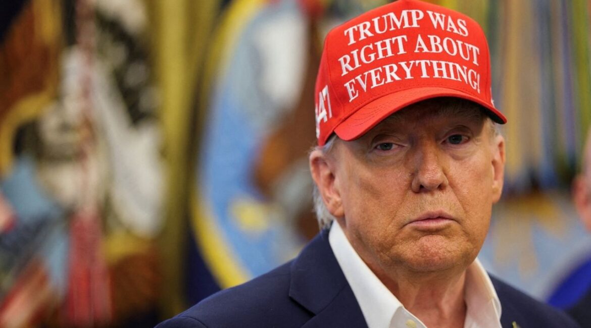 President Donald Trump wears a 'Trump Was Right About Everything!' hat, as he makes an announcement on the 2026 FIFA World Cup, in the Oval Office at the White House in Washington, D.C., U.S., August 22, 2025. (Reuters File)