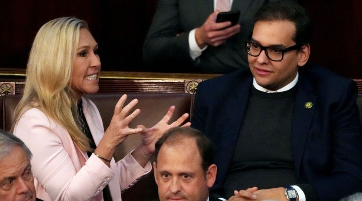 Reps. Marjorie Taylor Greene (R-Ga.) and George Santos (R-N.Y.) during the House speakership vote at the Capitol in Washington, Jan. 5, 2023. Greene, the brash MAGA adherent, sent a letter to the Justice Department’s pardon attorney asking that Santos’s 87-month prison term for wire fraud and aggravated identity theft be commuted, calling it “excessive” and a “grave injustice.” (Haiyun Jiang/The New York Times)