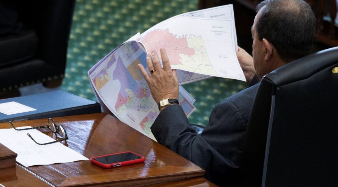 Republican State Senator Pete Flores looks over redistricting maps as the Republicans attempt to pass a bill that would redraw the state's 38 congressional districts, at the Texas State Capitol in Austin, Texas, U.S. August 22, 2025. (Reuters/Nuri Vallbona)