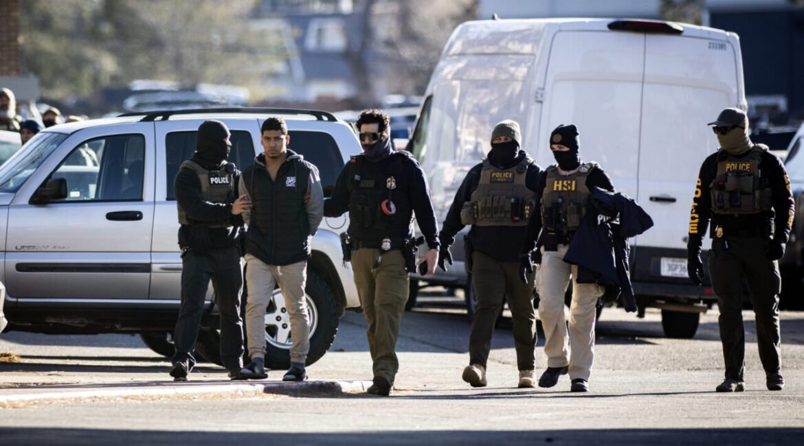 Image of man being detained in Denver by ICE agents