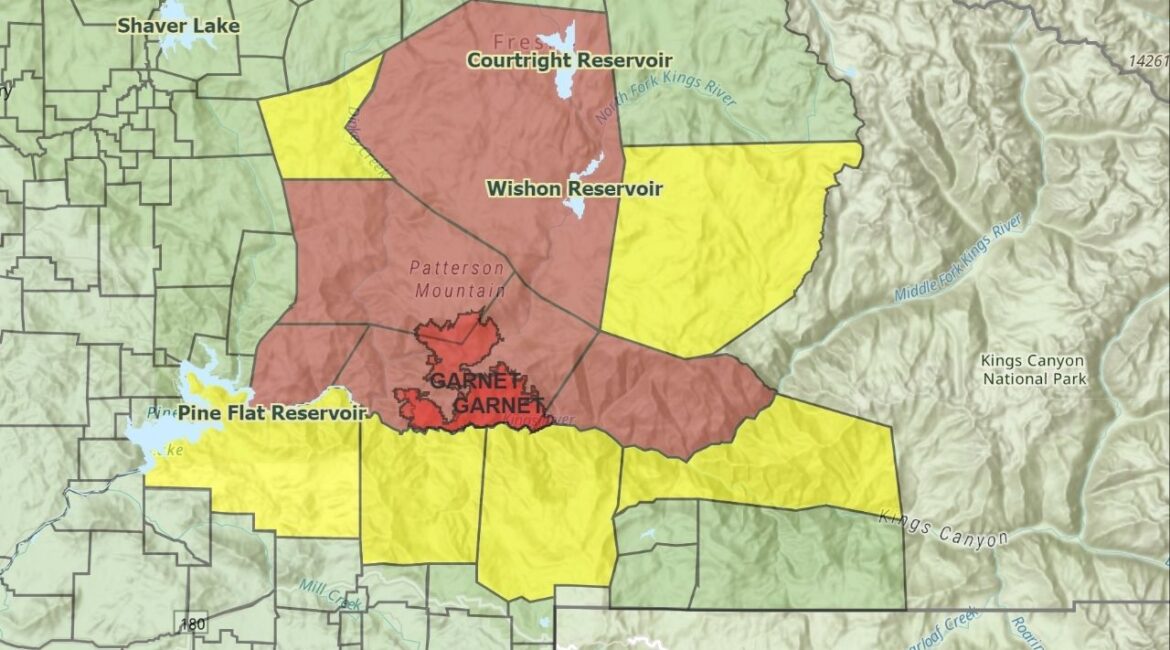 The Garnet Fire has burned nearly 14,000 acres in the Sierra National Forest with no containment, prompting new evacuation warnings and a state of emergency in Fresno County. (Fresno County SO)