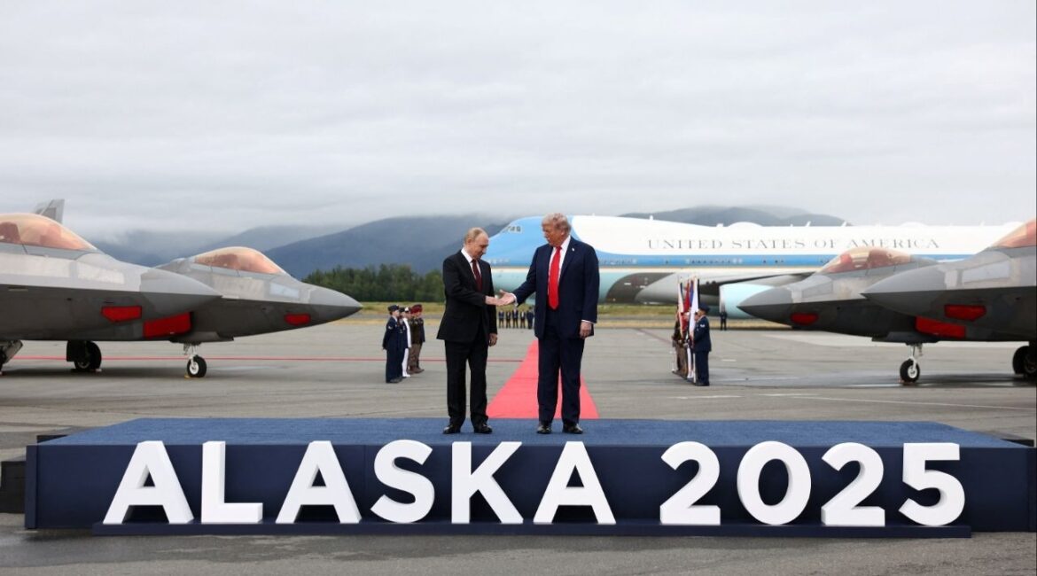 U.S. President Donald Trump goes to shake hands with Russian President Vladimir Putin, as they meet to negotiate for an end to the war in Ukraine, at Joint Base Elmendorf-Richardson in Anchorage, Alaska, U.S., August 15, 2025. (Reuters/Kevin Lamarque)