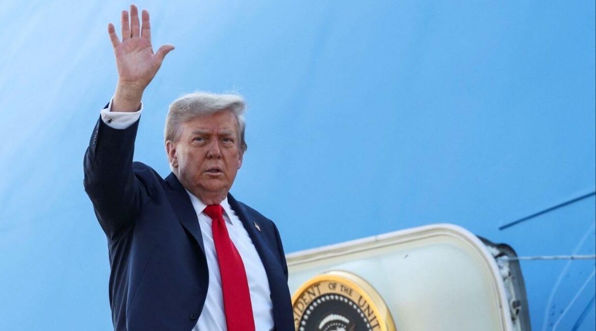 U.S. President Donald Trump waves while boarding Air Force One, as he departs for Alaska to meet with Russian President Vladimir Putin to negotiate for an end to the war in Ukraine, from Joint Base Andrews in Maryland, U.S., August 15, 2025. (Reuters/Kevin Lamarque)