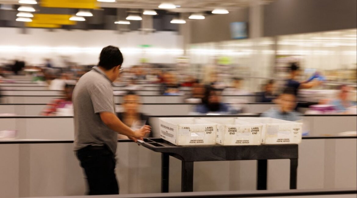 Workers process mail ballots at the Los Angeles County Ballot Processing Center in the city of Industry, California, U.S. October 29, 2024. (Reuters File)