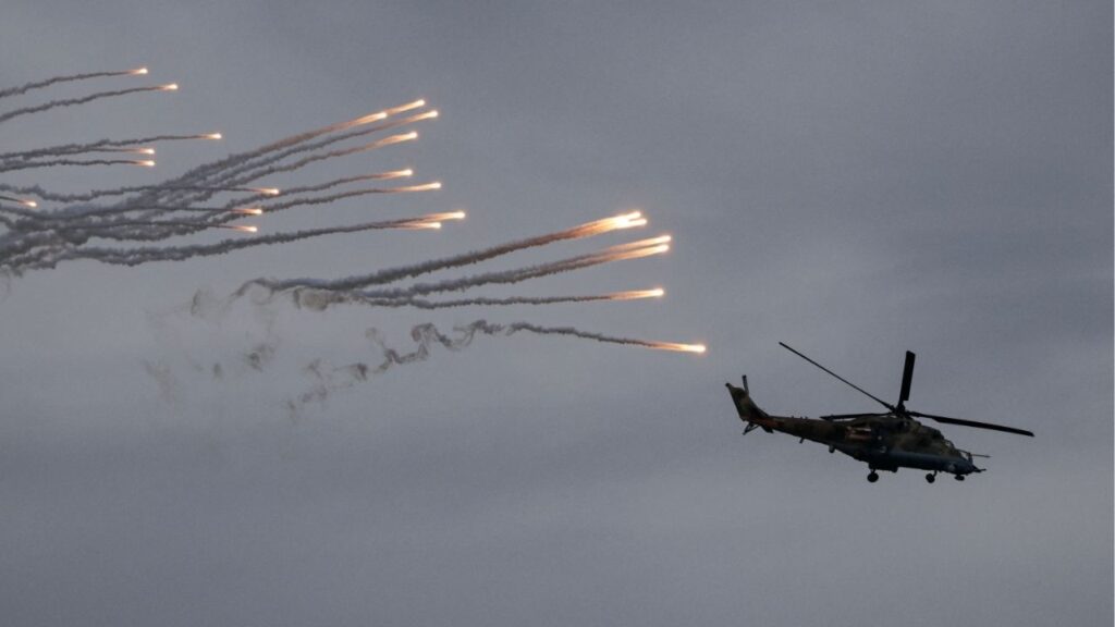 A Belarusian Mi-35 attack helicopter flies during the joint Russia-Belarus "Zapad-2025" military drills near Borisov, Belarus September 15, 2025. (Reuters/Ramil Sitdikov)