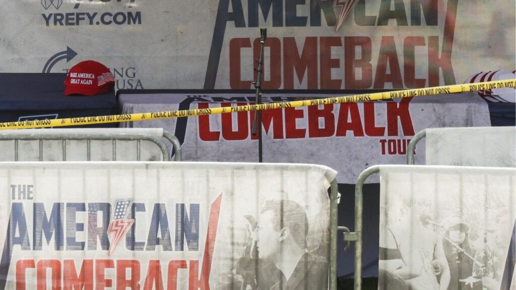 A Make America Great Again hat sits at a table inside a tent bearing the slogan 'The American Comeback Tour', cordoned off after U.S. right-wing activist, commentator, Charlie Kirk, an ally of U.S. President Donald Trump, was fatally shot during an event at Utah Valley University, in Orem, Utah, U.S. September 10, 2025. (Reuters/Jim Urquhart)