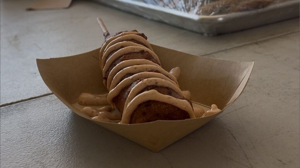 A Sandy's Corndog with all the fixings at Portola on Saturday, Sept. 20, 2025. (GV Wire)
