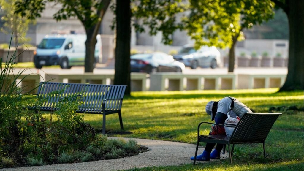 A homeless person sleeps on a bench in Washington, D.C., U.S., August 15, 2025. (Reuters File)
