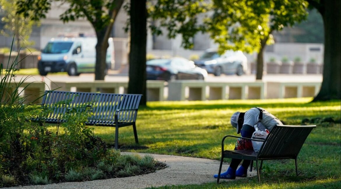 A homeless person sleeps on a bench in Washington, D.C., U.S., August 15, 2025. (Reuters File)