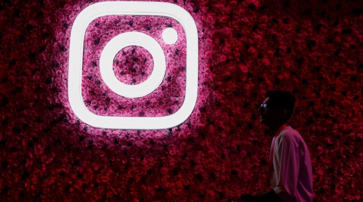 A man walks past a logo of mobile application Instagram, during a conference in Mumbai, India, September 20, 2023. (Reuters File)