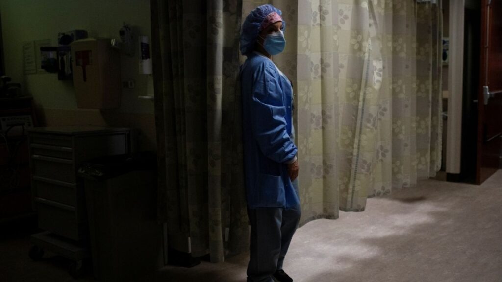 A nurse checks on a patient in the Triage area in a hospital in Royal Oak, Michigan, U.S., February 1, 2022. (Reuters File)