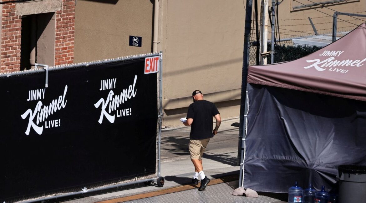 A person walks towards the theatre where "Jimmy Kimmel Live!" was recorded for broadcast following announcement by Disney that "Jimmy Kimmel Live" will return to its ABC network lineup on Tuesday, in Los Angeles, California, U.S. September 22, 2025.(Reuters/David Swanson)