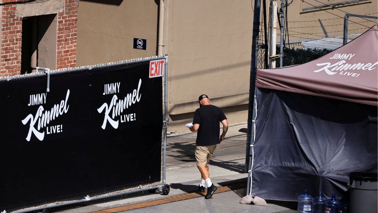 A person walks towards the theatre where "Jimmy Kimmel Live!" was recorded for broadcast following announcement by Disney that "Jimmy Kimmel Live" will return to its ABC network lineup on Tuesday, in Los Angeles, California, U.S. September 22, 2025.(Reuters/David Swanson)