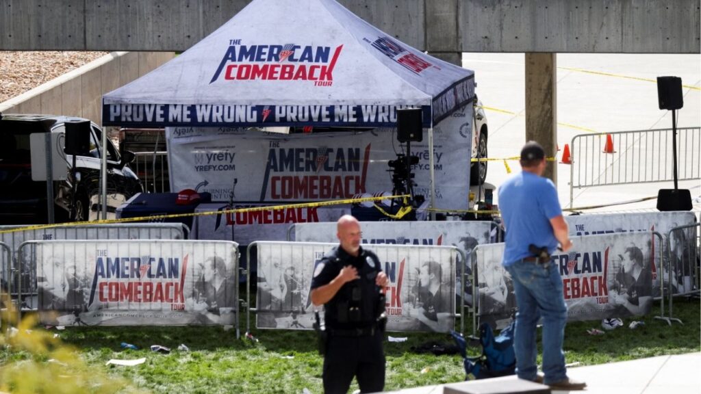 A police officer stands in front of a tent bearing the slogan 'The American Comeback Tour', cordoned off after U.S. right-wing activist, commentator, Charlie Kirk, an ally of U.S. President Donald Trump, was fatally shot during an event at Utah Valley University, in Orem, Utah, U.S. September 10, 2025. (Reuters/Jim Urquhart)