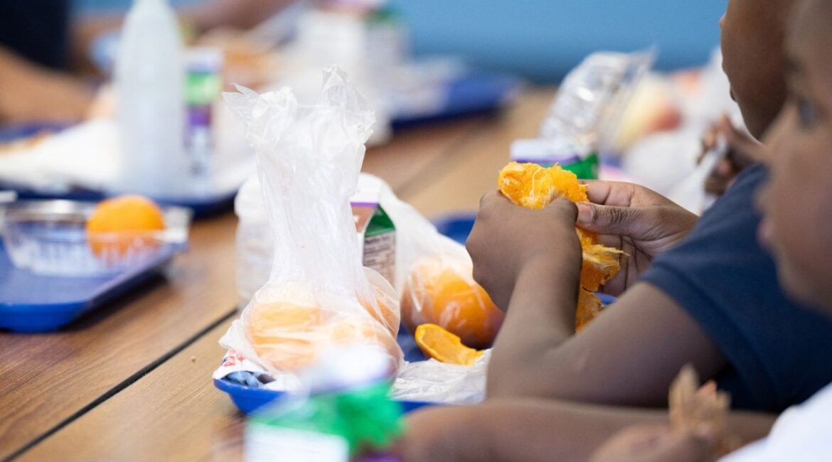 A student eats a local orange for lunch in Tucson, Arizona, U.S., April 29, 2025. (Reuters File)
