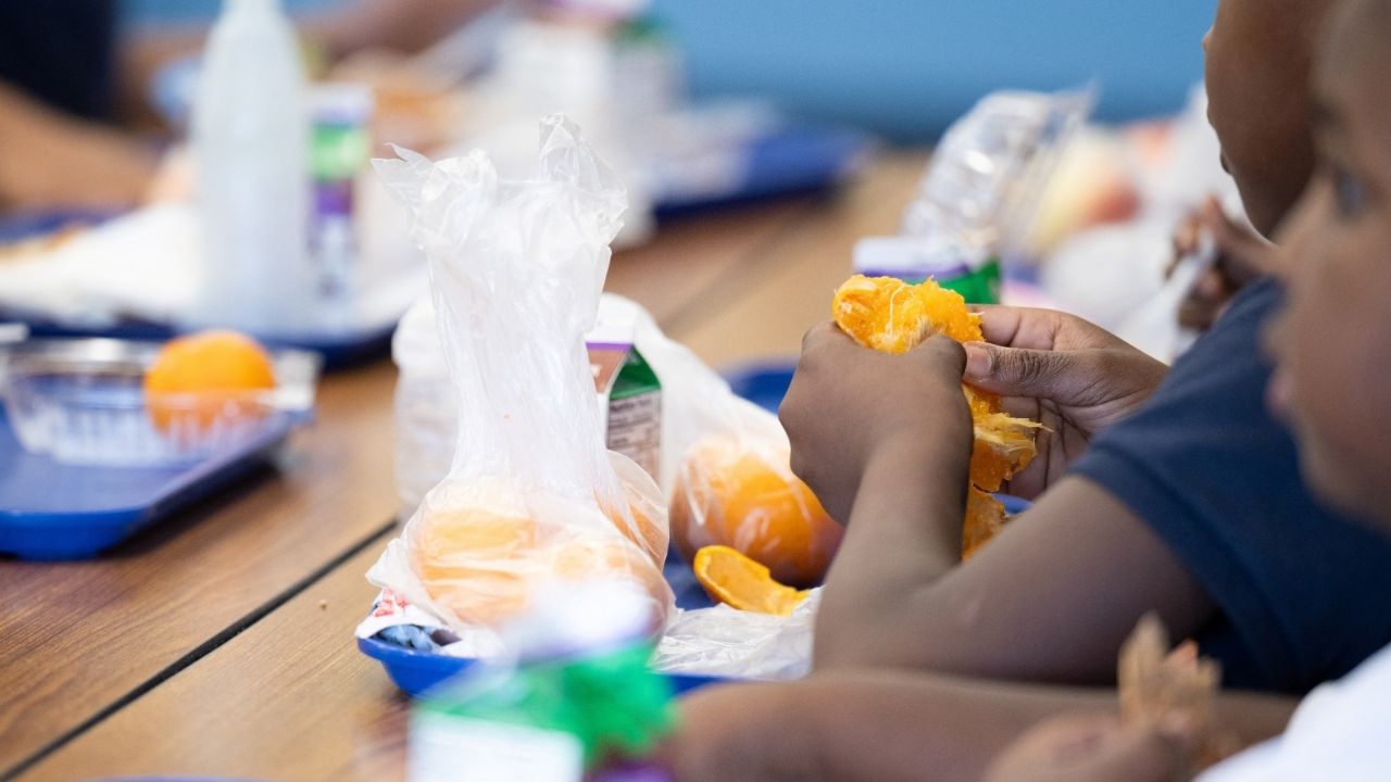 A student eats a local orange for lunch in Tucson, Arizona, U.S., April 29, 2025. (Reuters File)