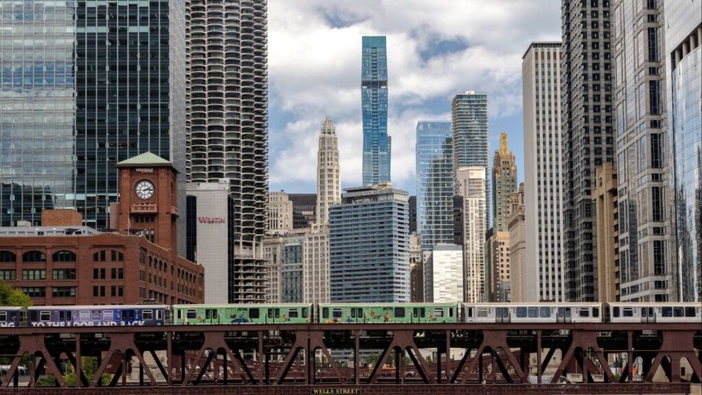 A subway train travels on an elevated track above the Wells Street bridge in Chicago, Illinois, U.S., August 25, 2025. (Reuters File)