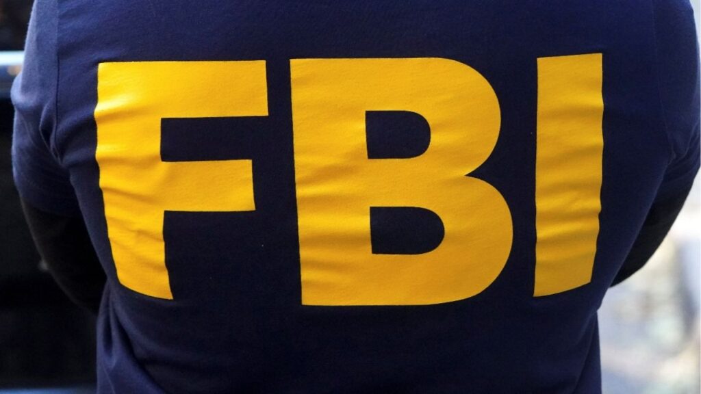 An FBI logo is pictured on an agent's shirt in the Manhattan borough of New York City, New York, U.S. October 19, 2021. (Reuters File)