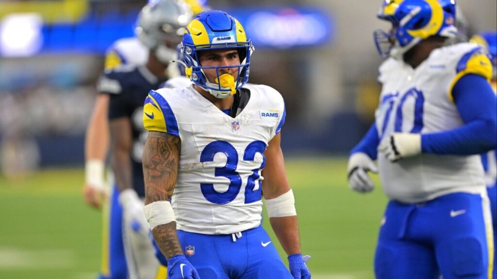 Aug 9, 2025; Inglewood, California, USA; Los Angeles Rams running back Cody Schrader (32) reacts after a first down during the second half against the Dallas Cowboys at SoFi Stadium. (Jayne Kamin-Oncea-Imagn Images)