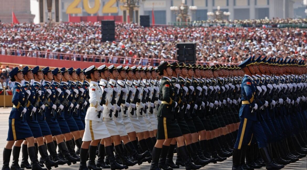 Chinese People's Liberation Army (PLA) honour guard members march during a military parade to mark the 80th anniversary of the end of World War Two, in Beijing, China, September 3, 2025. REUTERS/Tingshu Wang