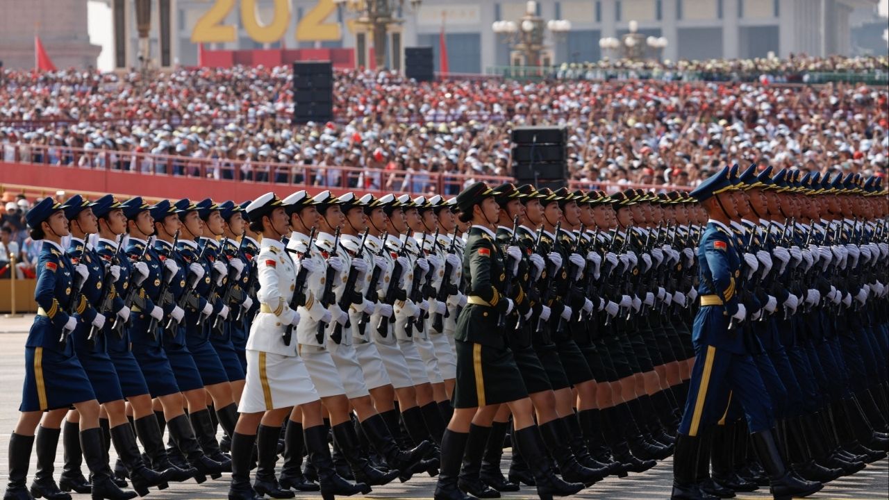 Chinese People's Liberation Army (PLA) honour guard members march during a military parade to mark the 80th anniversary of the end of World War Two, in Beijing, China, September 3, 2025. REUTERS/Tingshu Wang
