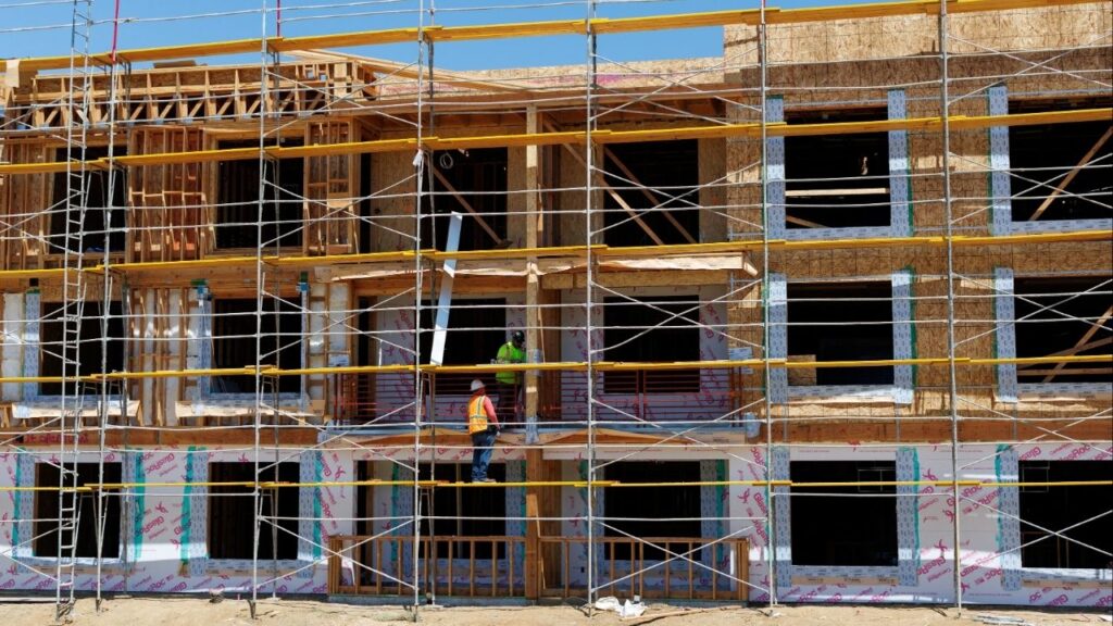 Construction workers are shown at work on a multi-unit residential housing project in Encinitas, California, U.S., July 28, 2025. (Reuters File)