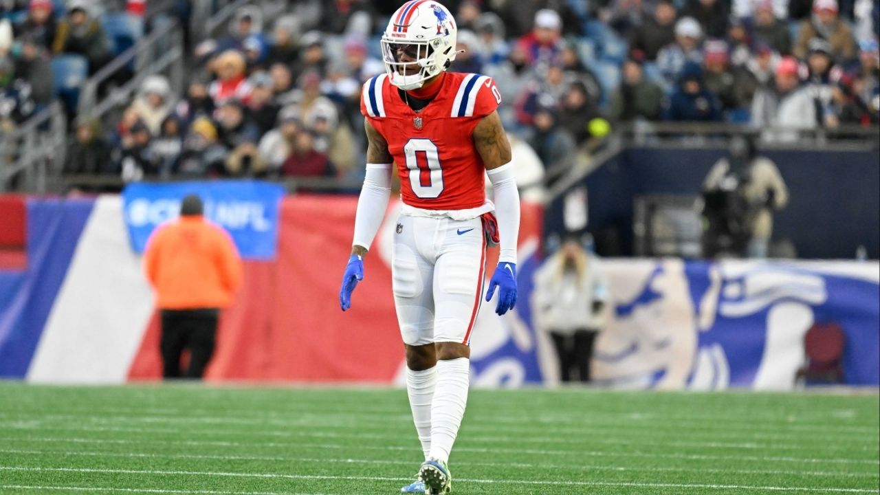 Dec 1, 2024; Foxborough, Massachusetts, USA; New England Patriots cornerback Christian Gonzalez (0) lines up during the second half against the Indianapolis Colts at Gillette Stadium. (Eric Canha-Imagn Images)