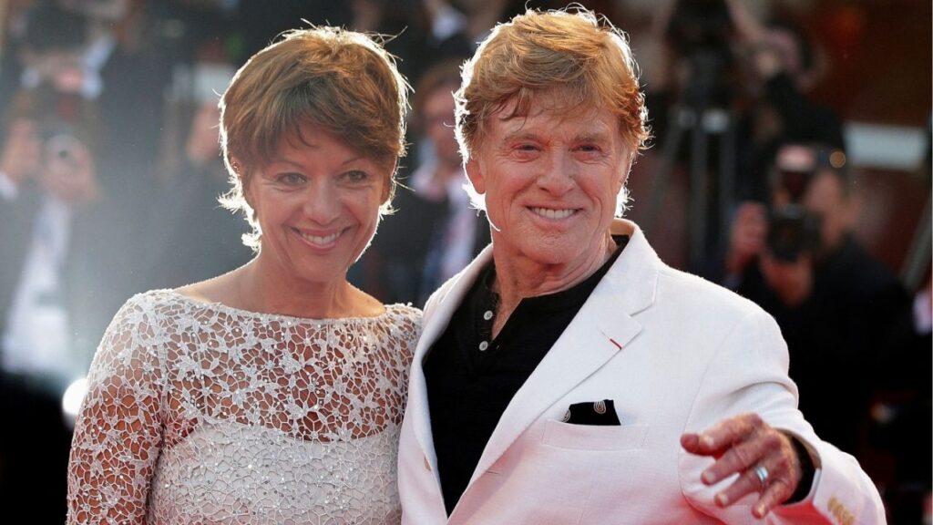Director Robert Redford (R) and his wife Sibylle pose on the red carpet during a screening for the movie "The Company You Keep" at the 69th Venice Film Festival September 6, 2012. (Reuters File)