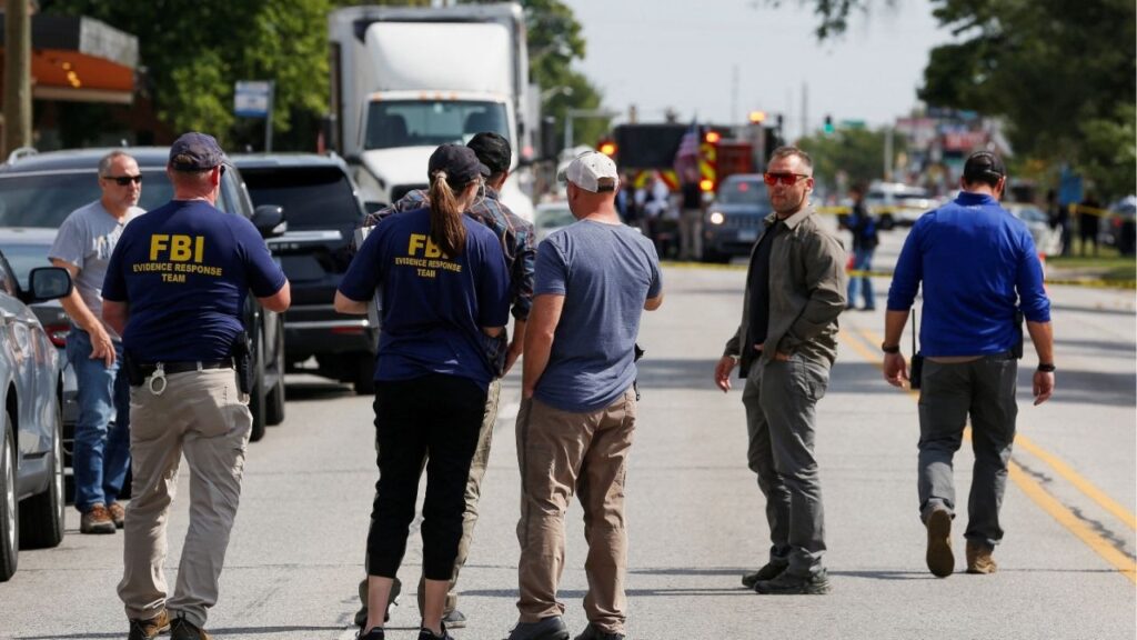 FBI agents, police officers and first responders work at the scene following reports of a shooting in Franklin Park village, northwest of Chicago, in Cook County, Illinois, U.S., September 12, 2025. (Reuters/Octavio Jones)