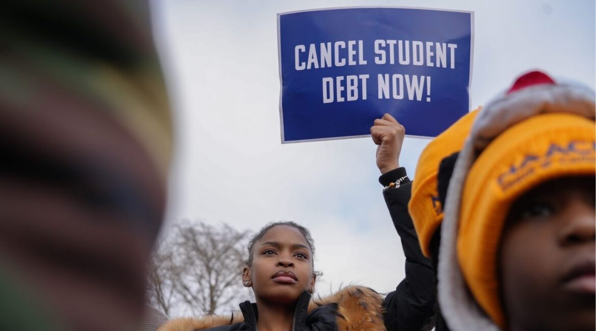 Feb 28, 2023; Washington, DC, USA; Protestors gather outside the U.S. Supreme Court ahead of the oral arguments in two cases that challenge President Joe Biden's $400 billion student loan forgiveness plan. (USA Today Network via Reuters)