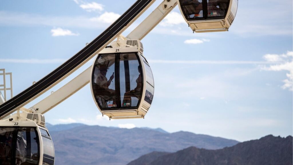 Festivalgoers ride the Ferris wheel during the Coachella Valley Music and Arts Festival at the Empire Polo Club in Indio, Calif., Saturday, April 22, 2023. (USA Today Network via Reuters)