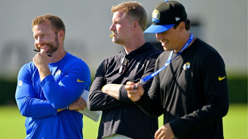 Jul 29, 2024; Los Angeles, CA, USA; Los Angeles Rams head coach Sean McVay, general manager Les Snead and chief of staff Carter Crutchfield talk on the field during training camp at Loyola Marymount University. (Jayne Kamin-Oncea-USA TODAY Sports)