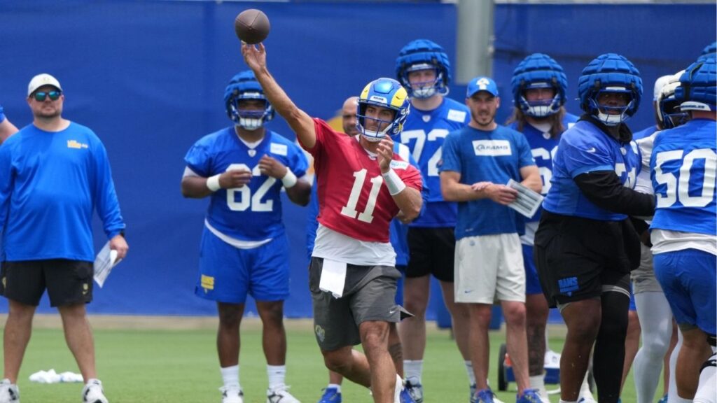 Jun 3, 2025; Woodland Hills, CA, USA; Los Angeles Rams quarterback Jimmy Garoppolo (11) throws the ball during organized team activities at Rams Practice Facility. (Kirby Lee-Imagn Images)