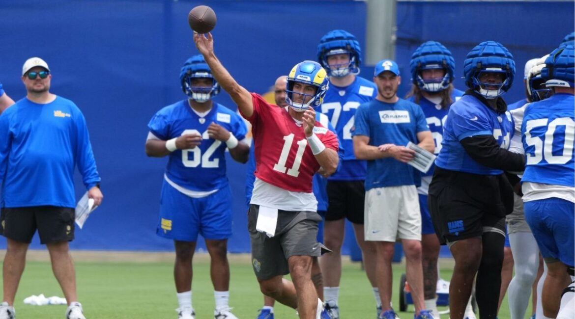 Jun 3, 2025; Woodland Hills, CA, USA; Los Angeles Rams quarterback Jimmy Garoppolo (11) throws the ball during organized team activities at Rams Practice Facility. (Kirby Lee-Imagn Images)
