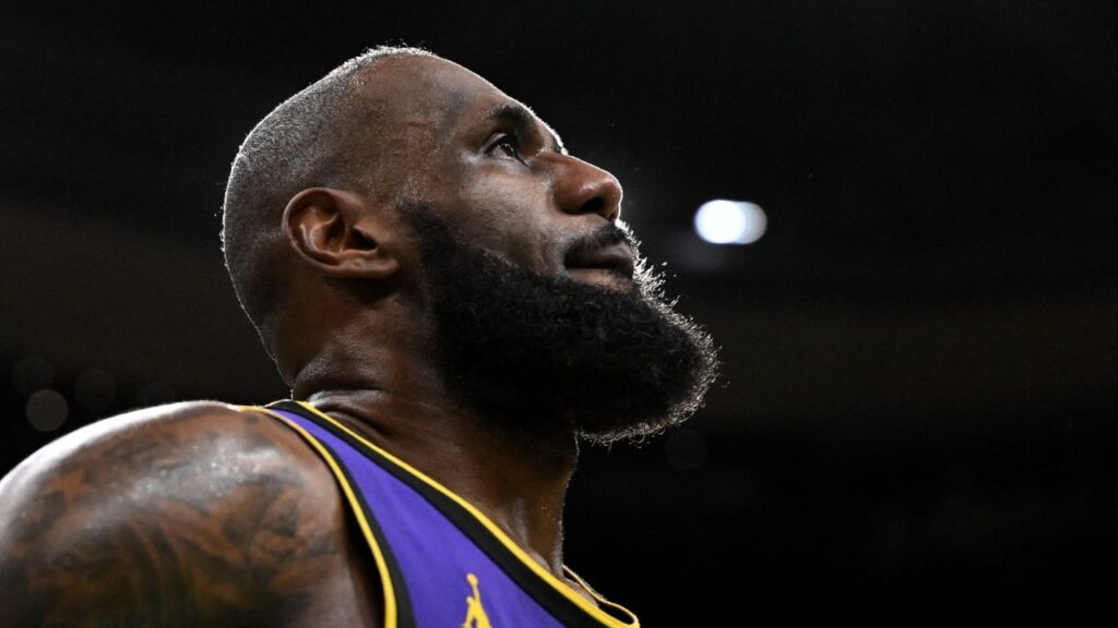 Mar 8, 2025; Boston, Massachusetts, USA; Los Angeles Lakers forward LeBron James (23) looks into the crowd during a timeout in the fourth quarter of a game against the Boston Celtics at the TD Garden. (Brian Fluharty-Imagn Images)