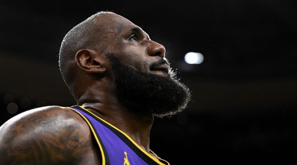 Mar 8, 2025; Boston, Massachusetts, USA; Los Angeles Lakers forward LeBron James (23) looks into the crowd during a timeout in the fourth quarter of a game against the Boston Celtics at the TD Garden. (Brian Fluharty-Imagn Images)