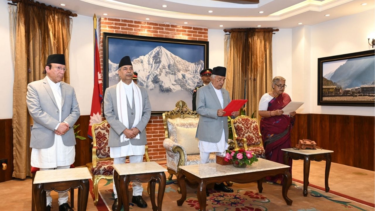 Nepal’s President Ramchandra Paudel administers the oath of office to Sushila Karki, a former Chief Justice, as Nepal’s interim prime minister during a swearing-in ceremony, following violent anti-graft protests, at the president's office in Kathmandu, Nepal, September 12, 2025. Nepal's President Office/Handout via REUTERS