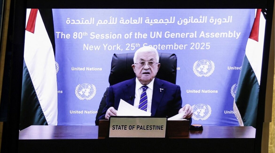 Palestinian President Mahmoud Abbas appears on a screen as he addresses the 80th United Nations General Assembly (UNGA), at the U.N. headquarters in New York, U.S., September 25, 2025. (Reuters/Jeenah Moon)