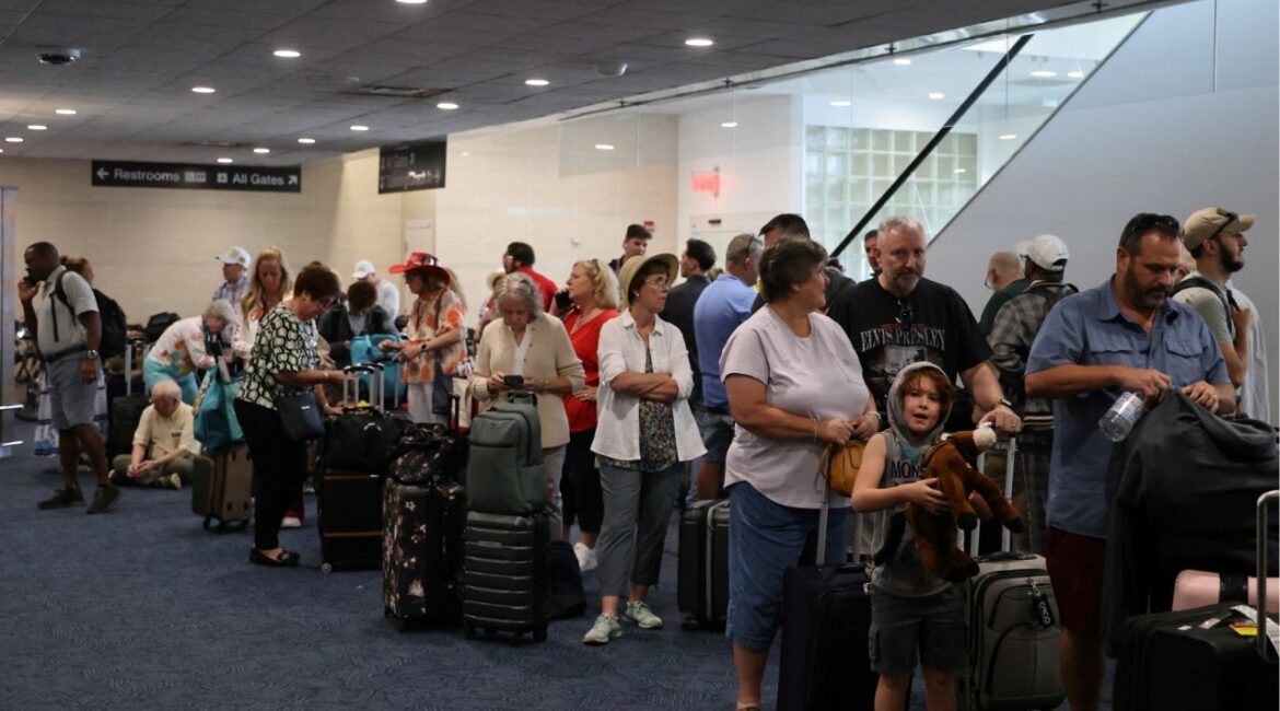 Passengers wait at Milwaukee Mitchell International Airport in Milwaukee, Wisconsin, U.S., July 19, 2024. (Reuters File)