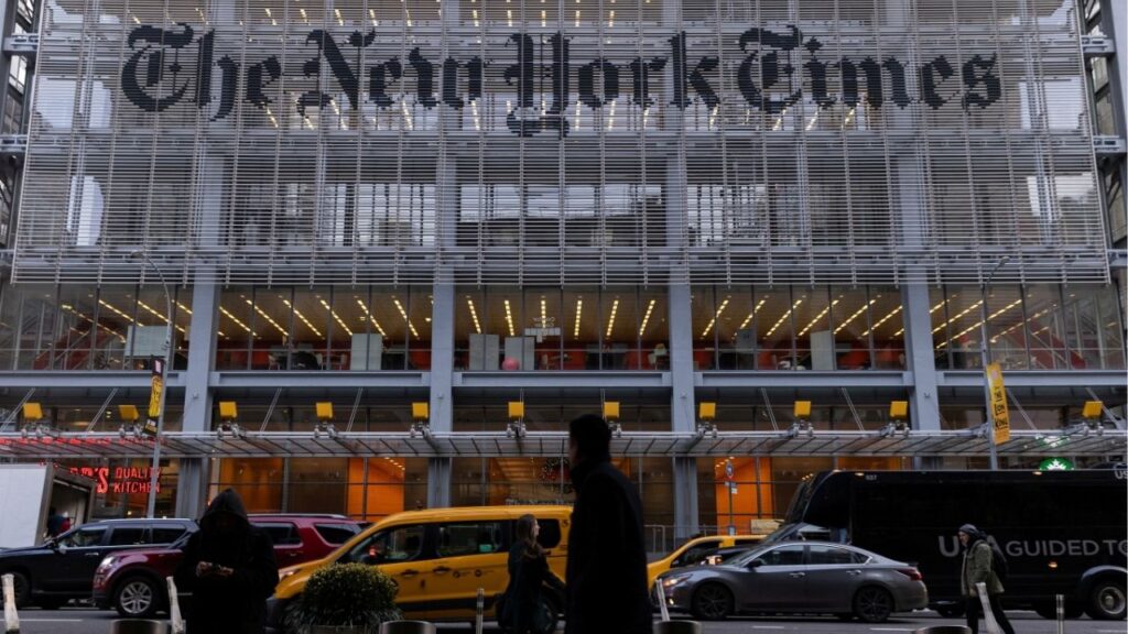 Pedestrians walk by the New York Times building in Manhattan, New York, U.S., December 8, 2022. (Reuters File)
