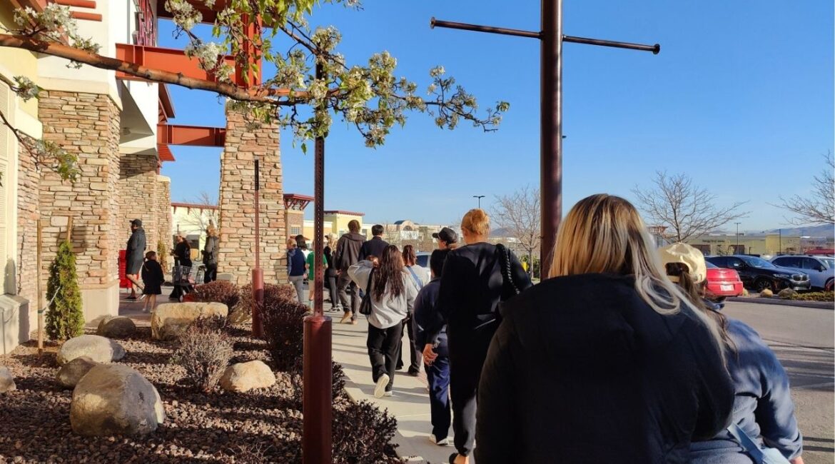 People line up at the Trader Joe's at the Shayden Summit mall in south Reno on April 9, 2025, during a restock of its viral mini canvas tote bags. (USA Today Network via Reuters)
