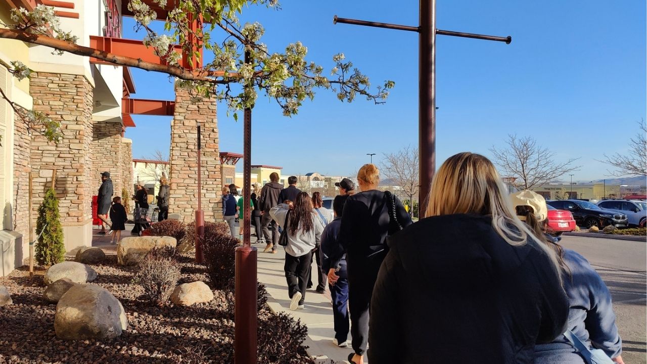 People line up at the Trader Joe's at the Shayden Summit mall in south Reno on April 9, 2025, during a restock of its viral mini canvas tote bags. (USA Today Network via Reuters)