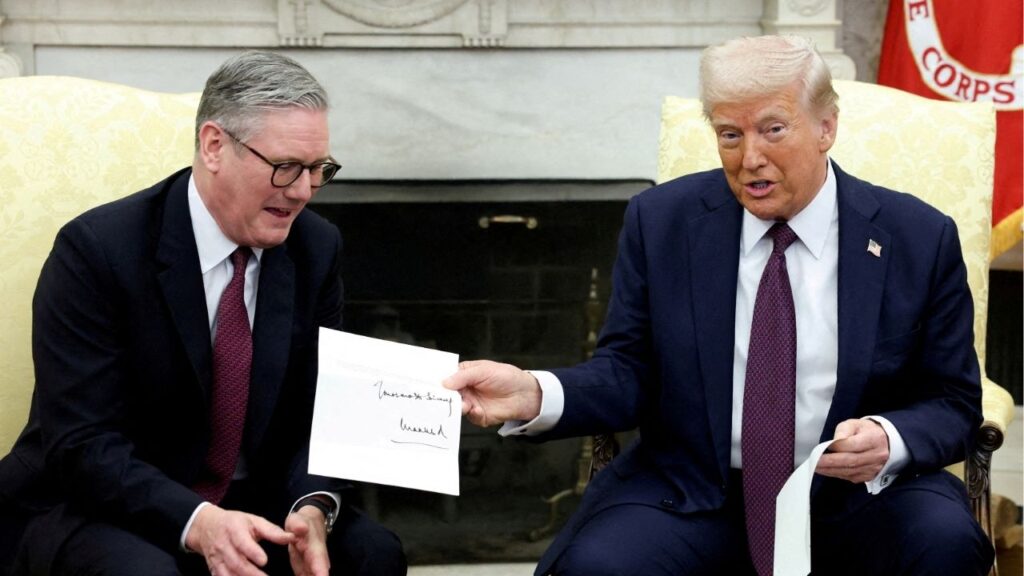 President Donald Trump holds a letter from Britain's King Charles as he meets with British Prime Minister Keir Starmer in the Oval Office at the White House in Washington, D.C., U.S., February 27, 2025. (Reuters File)