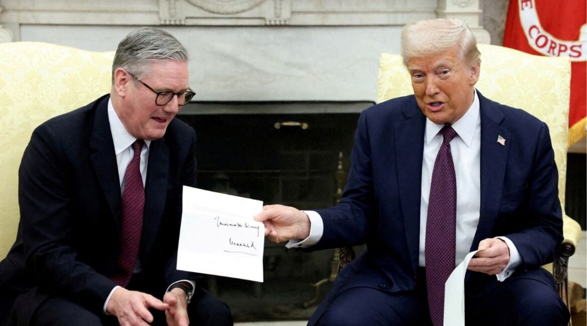 President Donald Trump holds a letter from Britain's King Charles as he meets with British Prime Minister Keir Starmer in the Oval Office at the White House in Washington, D.C., U.S., February 27, 2025. (Reuters File)
