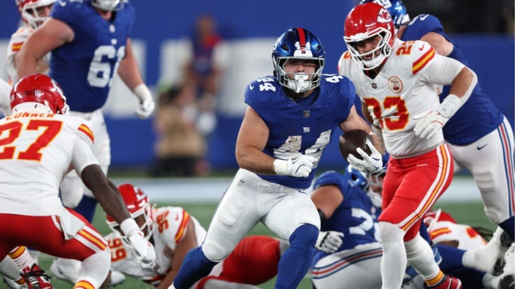 Sep 21, 2025; East Rutherford, New Jersey, USA; New York Giants running back Cam Skattebo (44) runs against the Kansas City Chiefs in the second quarter at MetLife Stadium. (Vincent Carchietta-Imagn Images)