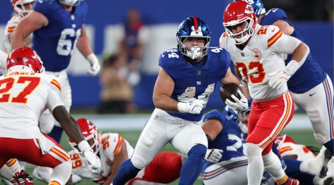 Sep 21, 2025; East Rutherford, New Jersey, USA; New York Giants running back Cam Skattebo (44) runs against the Kansas City Chiefs in the second quarter at MetLife Stadium. (Vincent Carchietta-Imagn Images)